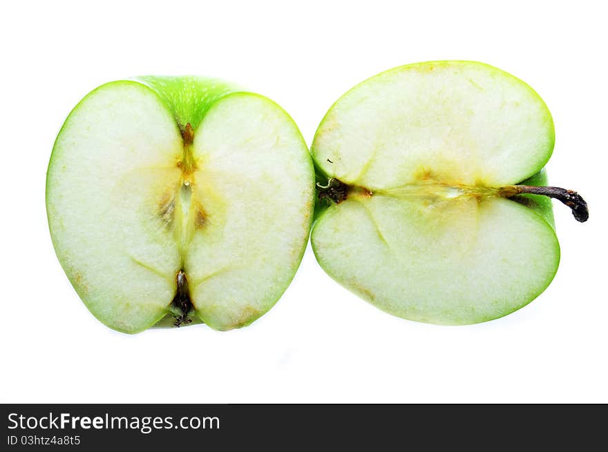 Two pieces green apple isolated on white background.