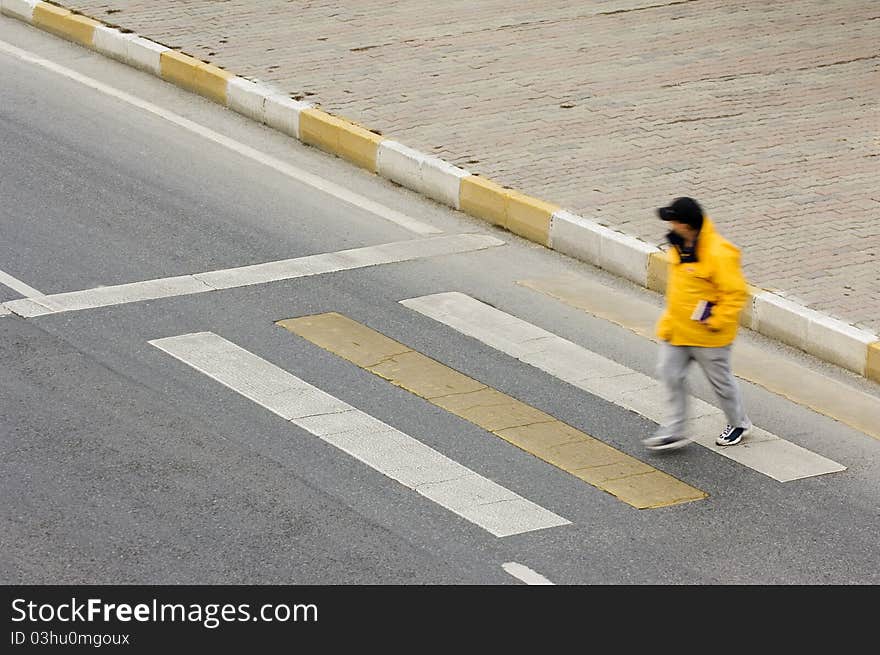 People walking in zebra crossing area. Motion blurred. People walking in zebra crossing area. Motion blurred