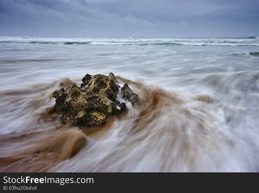 Stream on a rock at sea. Stream on a rock at sea