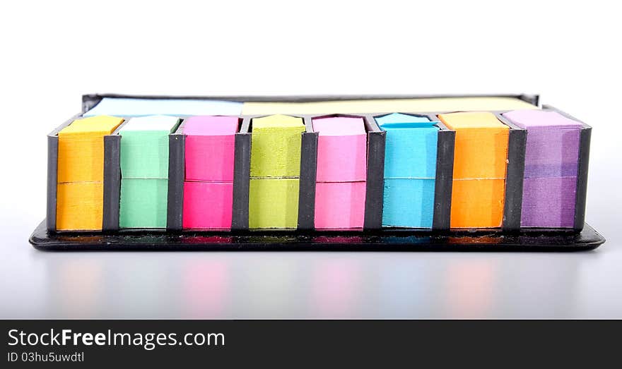 Multicolored post it notes isolated on white background