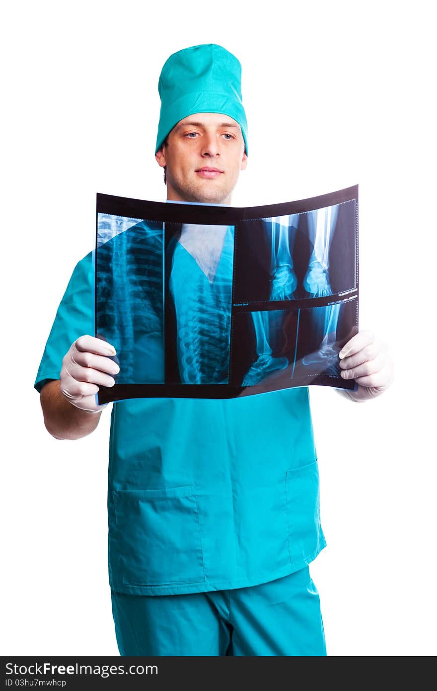 Portrait of a surgeon looking at the x-ray photograph. isolated on white background