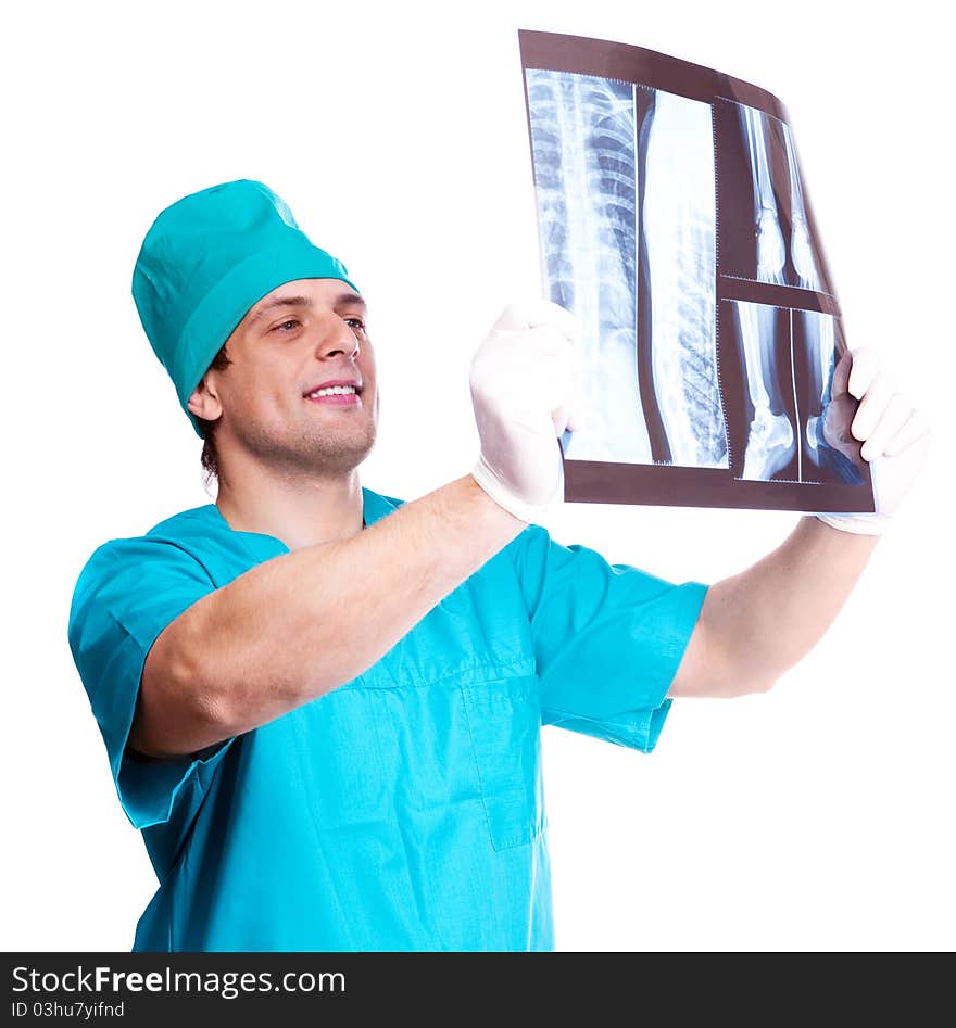 Portrait of a surgeon looking at the x-ray photograph. isolated on white background