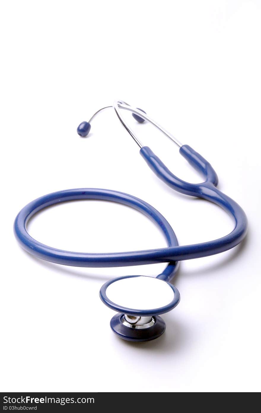 One blue stethoscope with isolated white background.