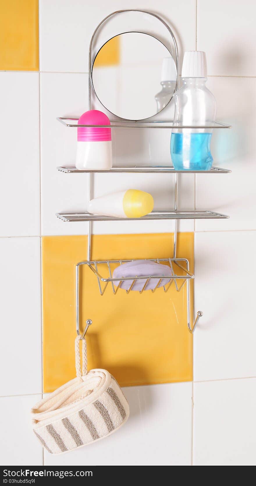 Bath objects on rack in a shower. Bath objects on rack in a shower.