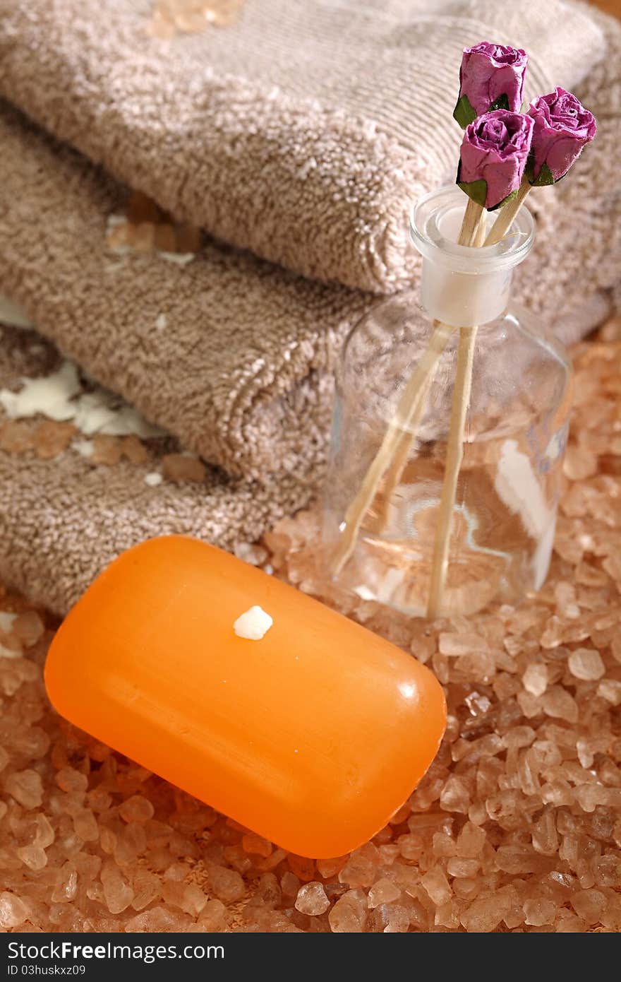 Soap and towels placed on a bathing salt. Soap and towels placed on a bathing salt