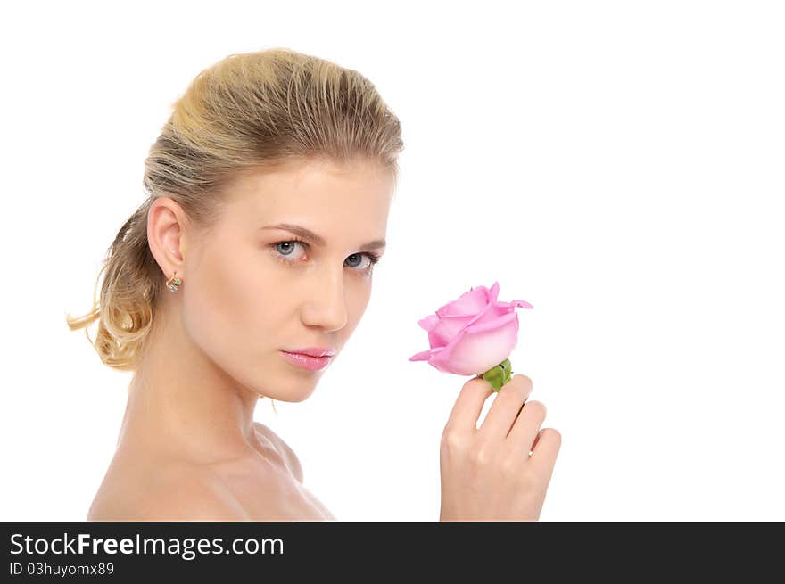 Beautiful blonde with pink rose isolated on white