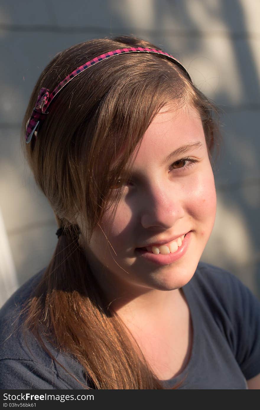 A nice portrait of a cute teenage girl in the evening sun. A nice portrait of a cute teenage girl in the evening sun