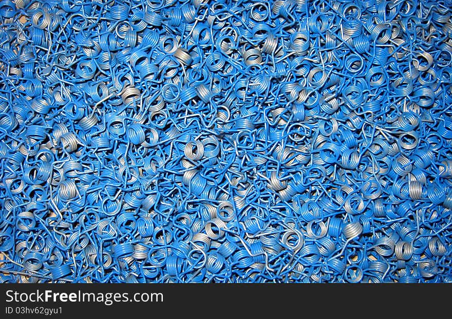 Set of blue springs in bulk ready for assembly. Set of blue springs in bulk ready for assembly