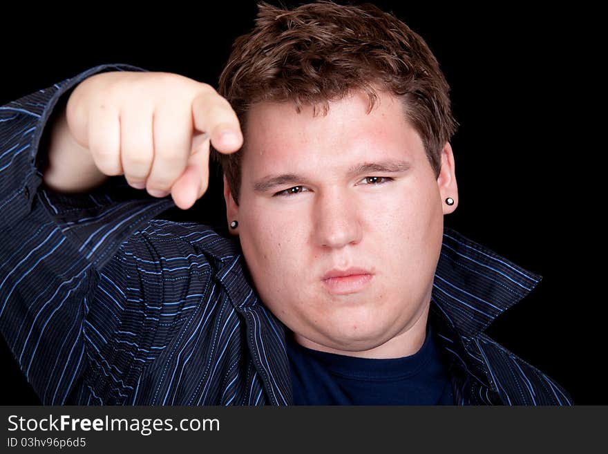 Young Man In A Blue Shirt and Pointing