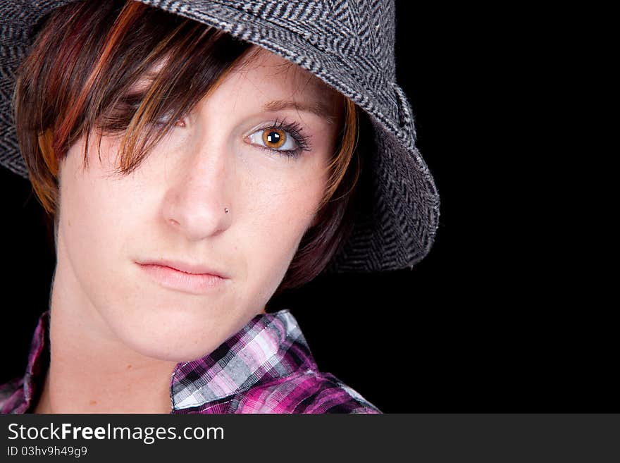 Pretty Girl In A Pink And Black Shirt And A Hat