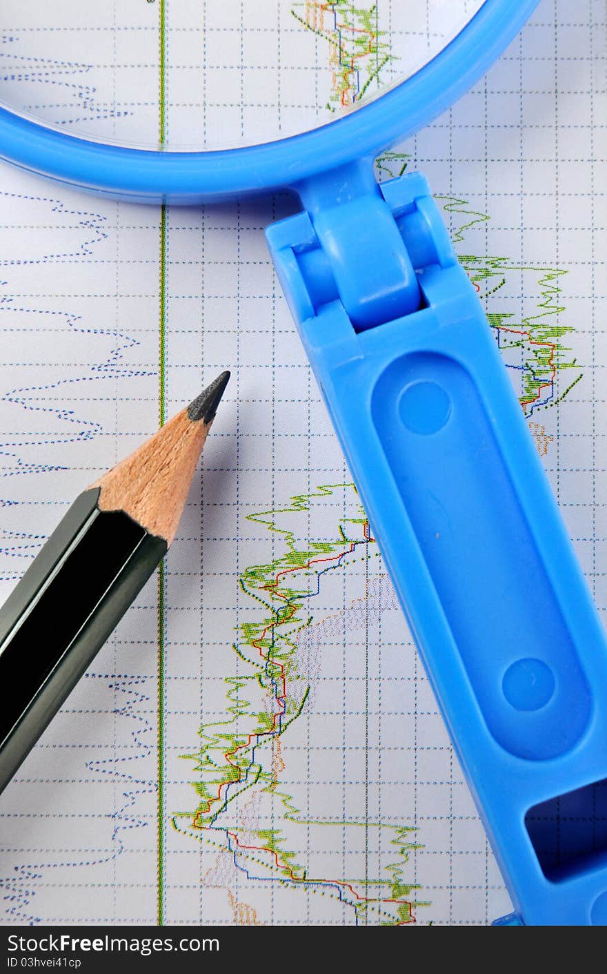 Stock chart statistical chart with a pencil and magnifier, shown as analysis for stock or currency marketing and trend, or related business and finance concept. Stock chart statistical chart with a pencil and magnifier, shown as analysis for stock or currency marketing and trend, or related business and finance concept.