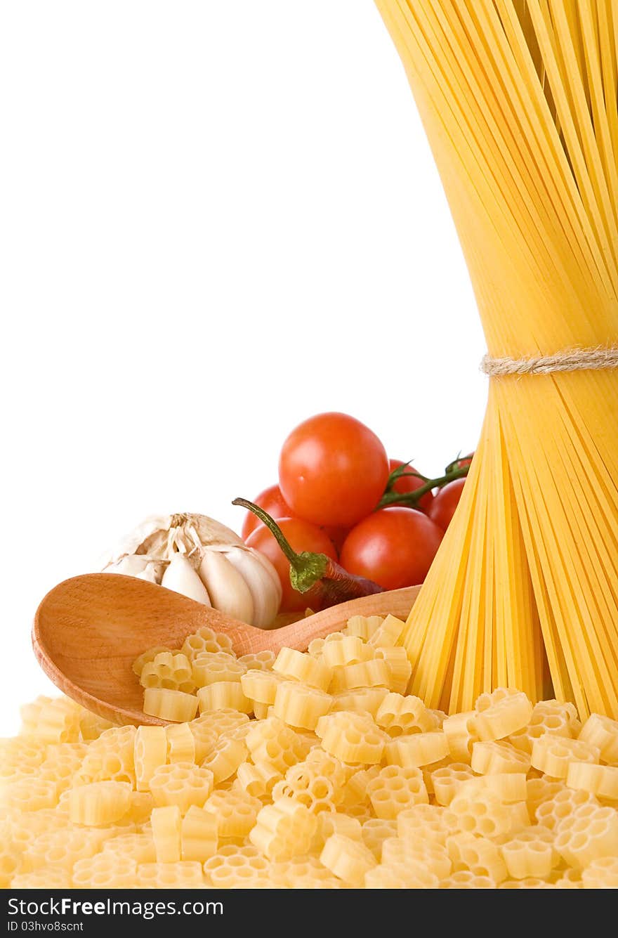 Raw Pasta And Wooden Spoon Isolated