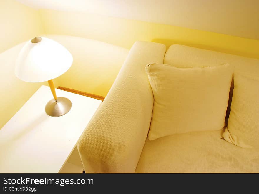 Home cosy corner with sofa and lamp