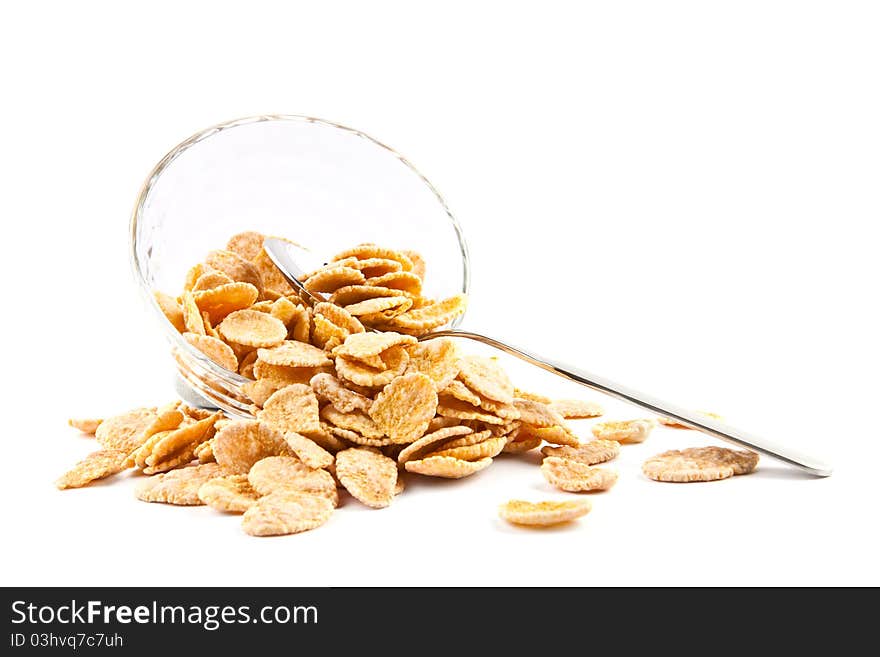 Bowl of dried cornflakes and spoon