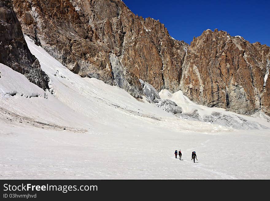 Climbers In The Snowy Mountains