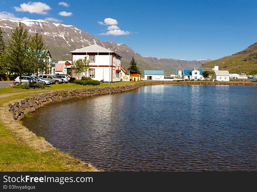 Seydisfjordur, small typical village in Iceland. Summer day. Seydisfjordur, small typical village in Iceland. Summer day.