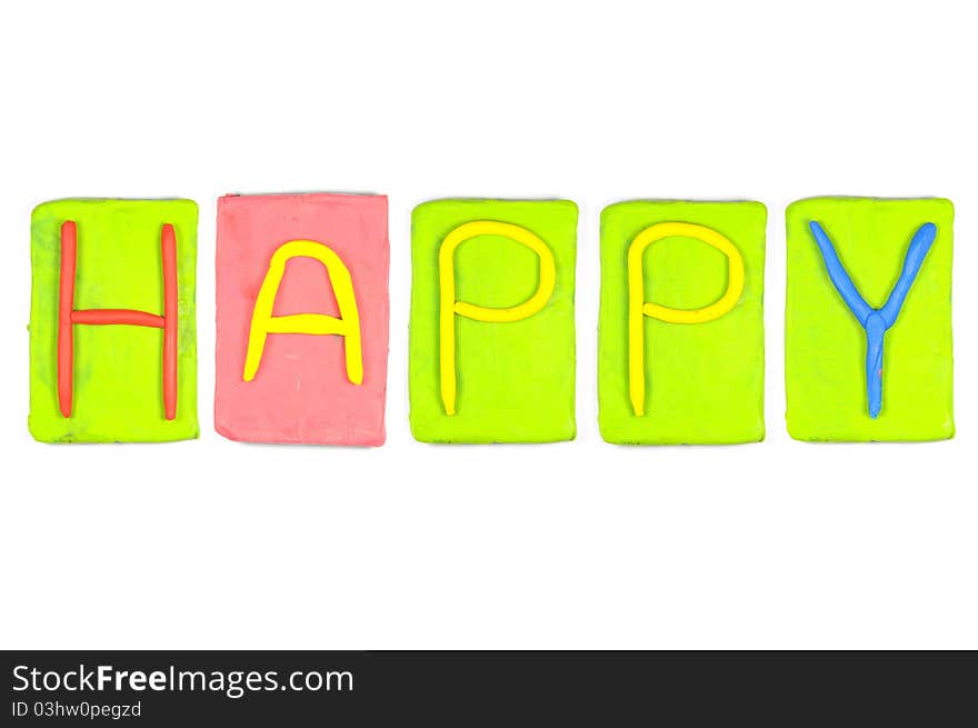 Clay letters. Words HAPPY isolated on the white background