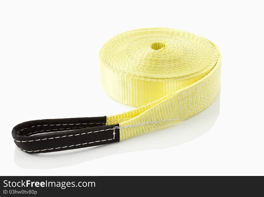 A yellow slackline on white background