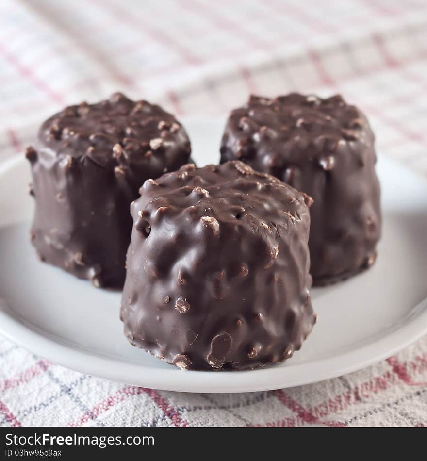 Chocolate cookies with peanuts close up photo