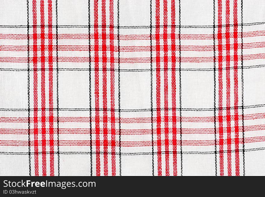 Checkered red and white tablecloth macro background. Checkered red and white tablecloth macro background