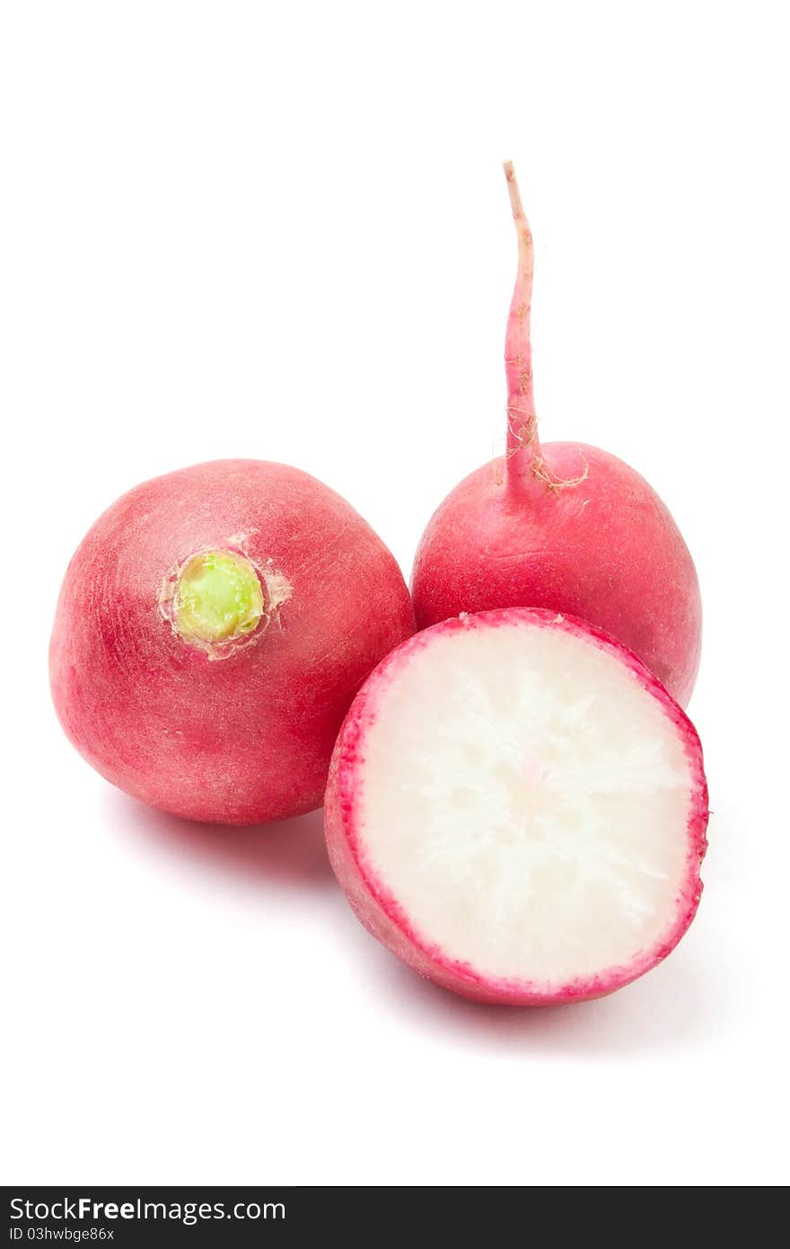 Three radishes isolated on white