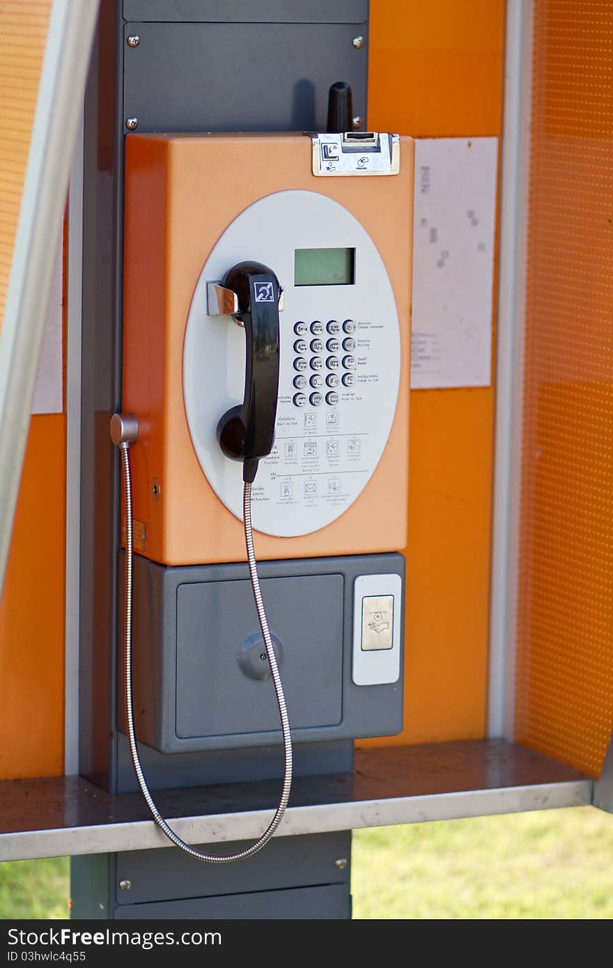 Lonely Orange Public Telephone in Thailand