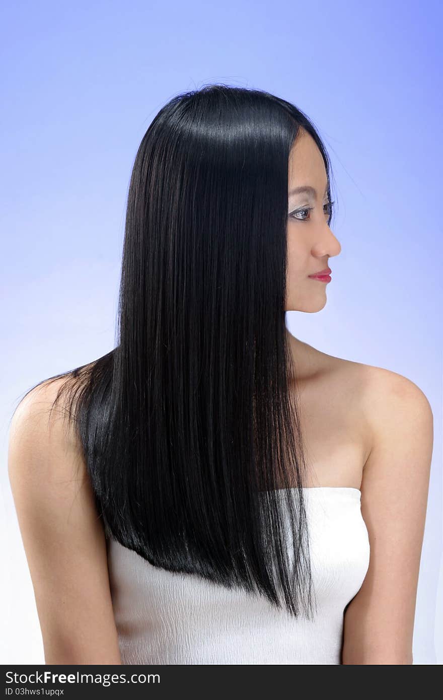 Portrait of beautiful young woman with long straight black hair. Portrait of beautiful young woman with long straight black hair