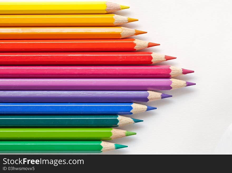 Colorful pens on white background