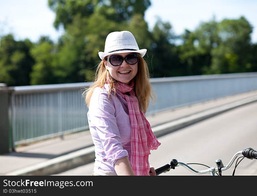 Happy blond woman with cowboy s hat