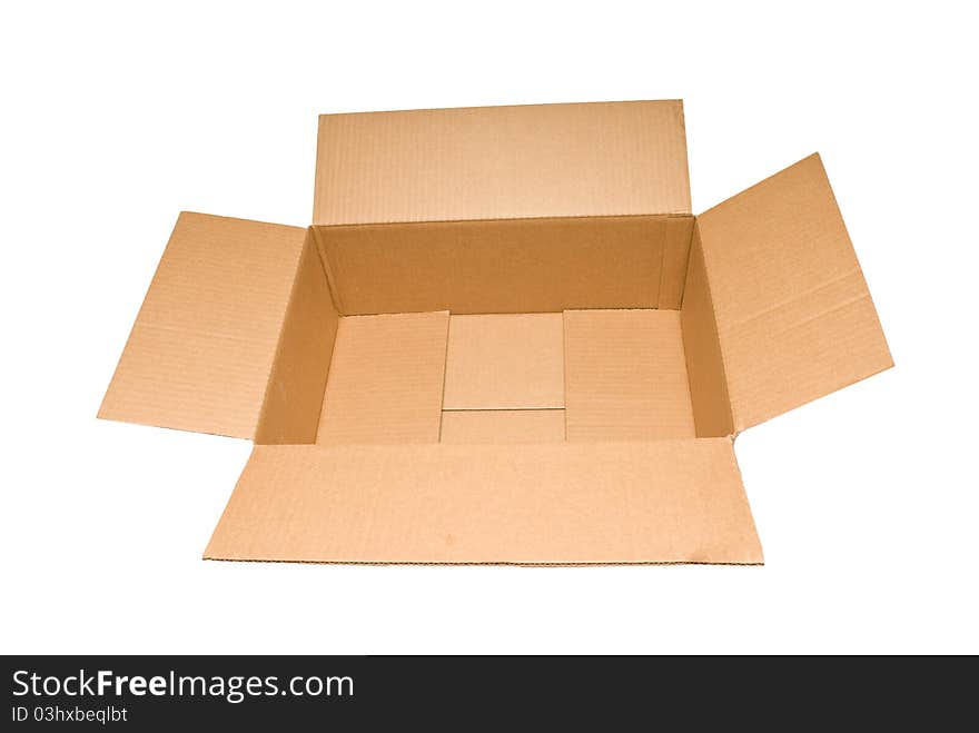 Empty cardboard box that has a wide width and short sides.  Isolated on white.  Studio shot. Empty cardboard box that has a wide width and short sides.  Isolated on white.  Studio shot.