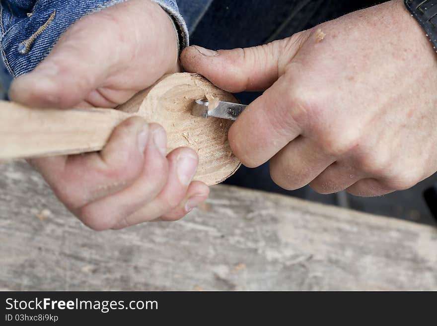 Wood carving process with metal chisel