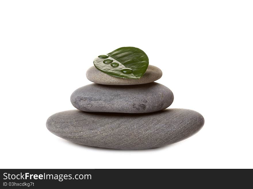 Zen stone with leaf,isolated on white.