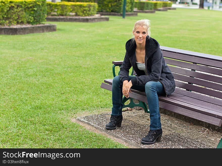 Young attractive woman relax in the park