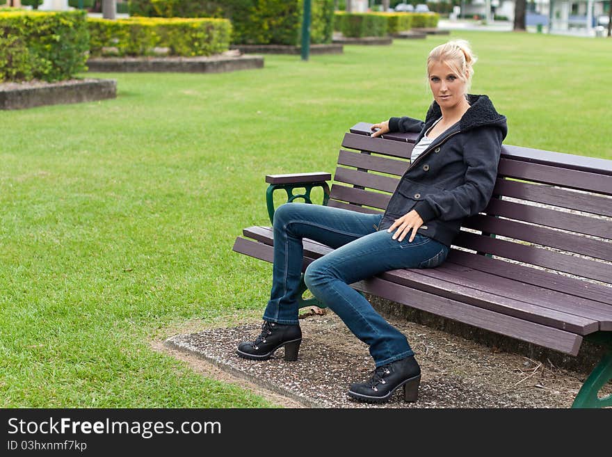 Young attractive woman relax in the park