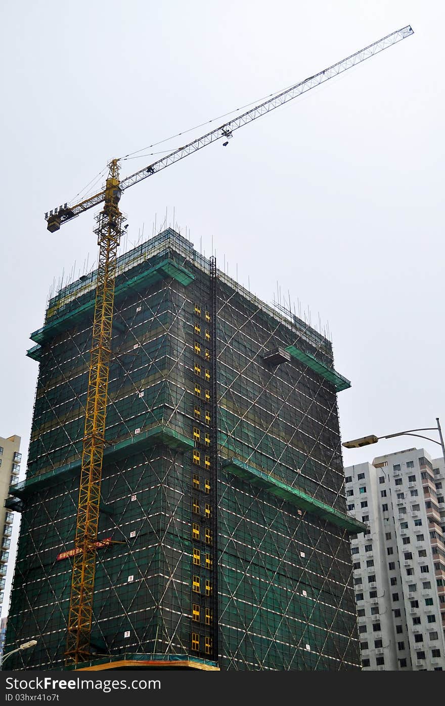 The photo of Building under construction .