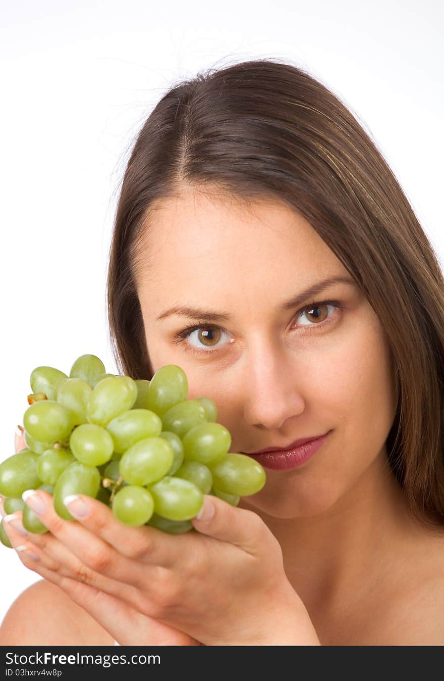 Young woman and fresh grapes