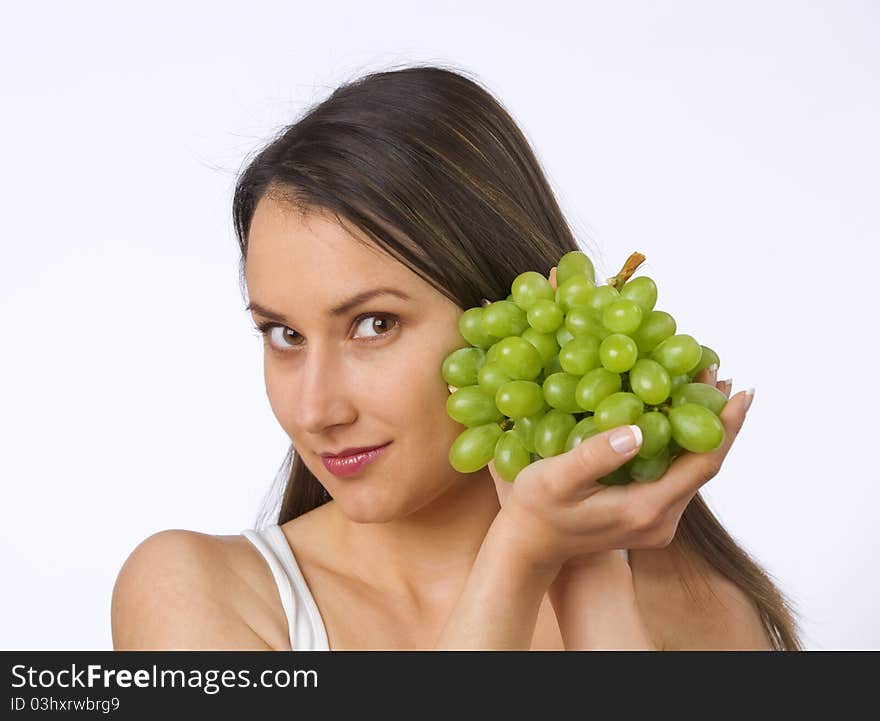 Young Woman And Fresh Grapes