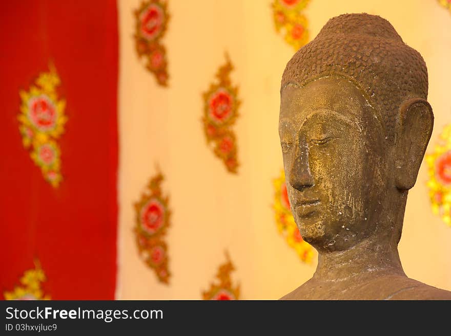 Buddha head statue over traditional Thai style painting, Ayutthaya. Buddha head statue over traditional Thai style painting, Ayutthaya