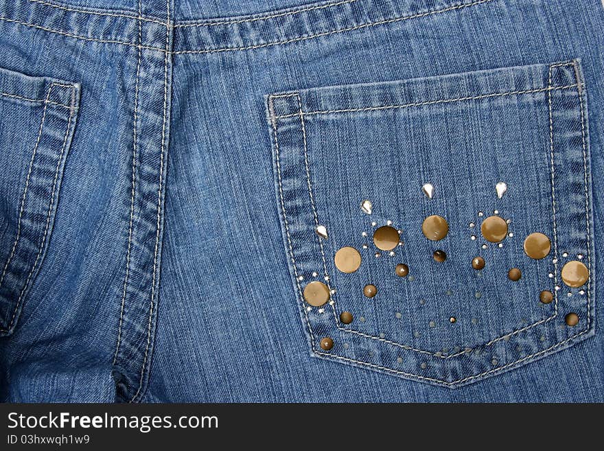 Fancy pocket with rhinestones on women's jeans. Fancy pocket with rhinestones on women's jeans.