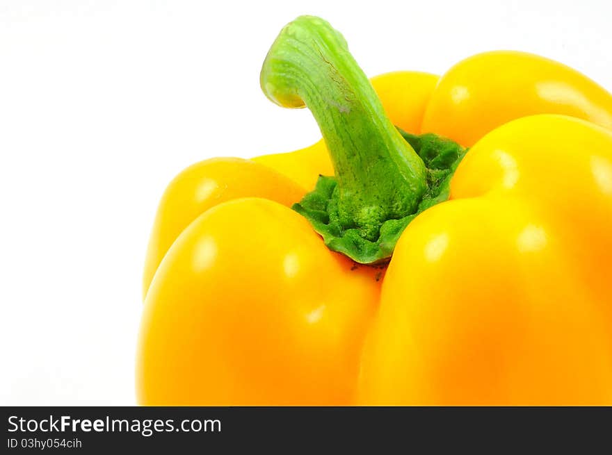 Isolated close up yellow bell pepper on white background