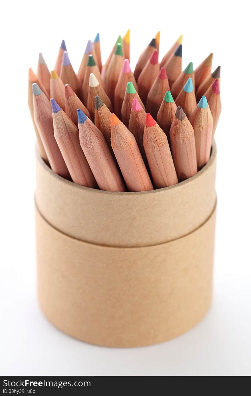 Close up of colorful color pencils over white background.