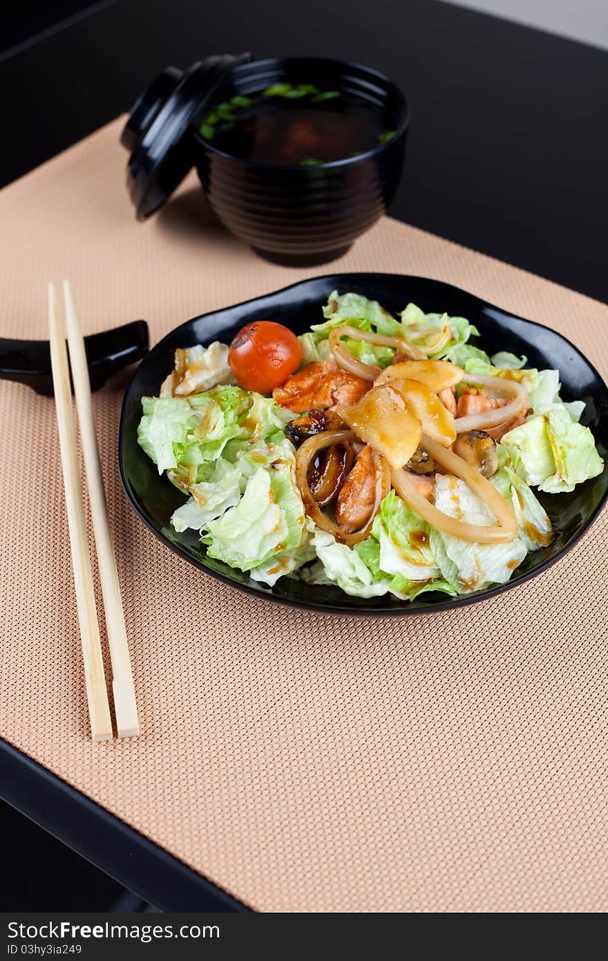 Japanese table place setting with salad. Ready for dinner. Japanese table place setting with salad. Ready for dinner