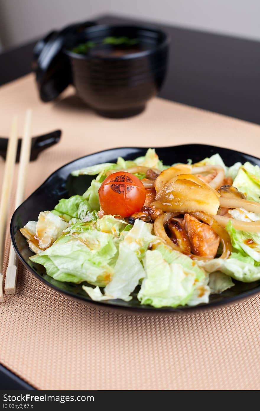 Japanese table place setting with salad. Ready for dinner. Japanese table place setting with salad. Ready for dinner