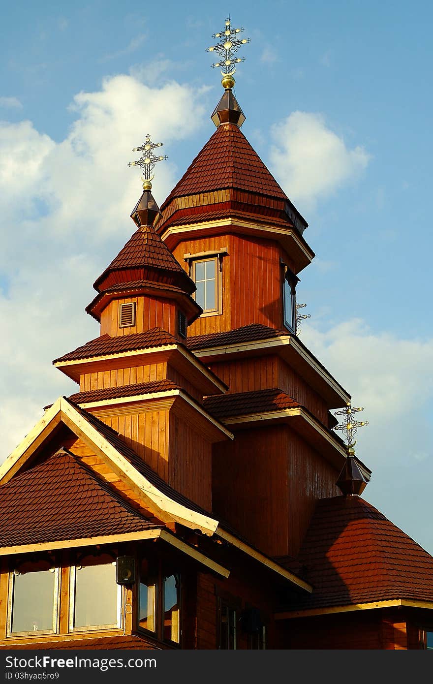 Facade Of A Building Of Wooden Catholic Church