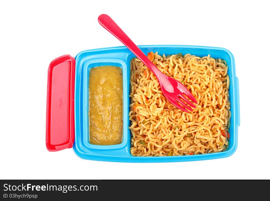 Noodles and chilli sauce in a colorful box