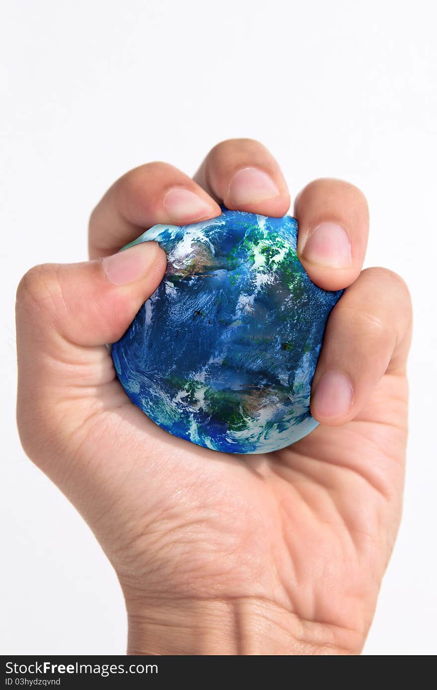 Hand squeezing earth