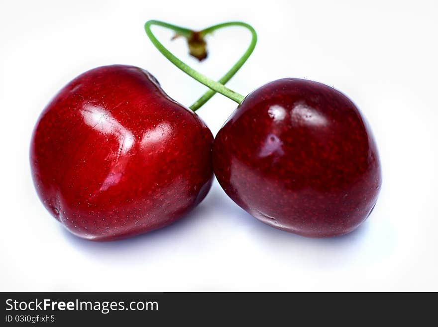 Fresh cherries isolated on a white background