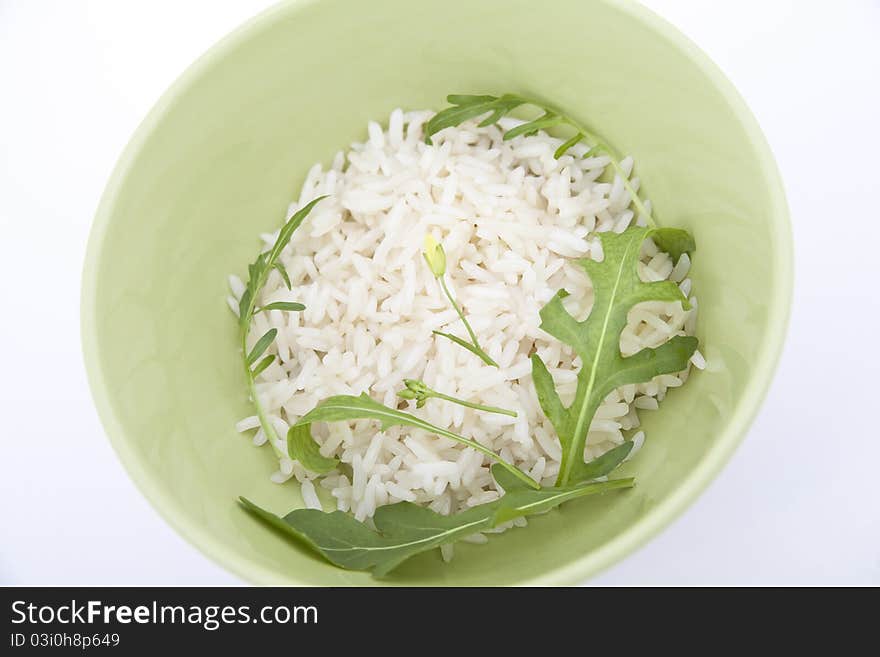 Rice with green tarragon leaves