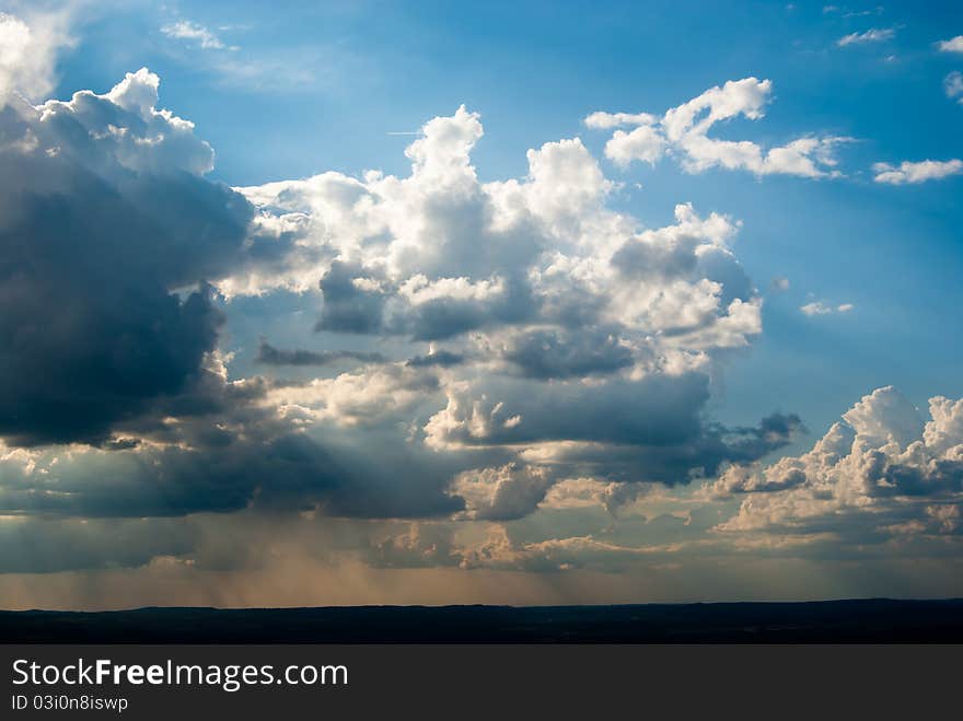 Dissolving Thunderstorm Near Sunset