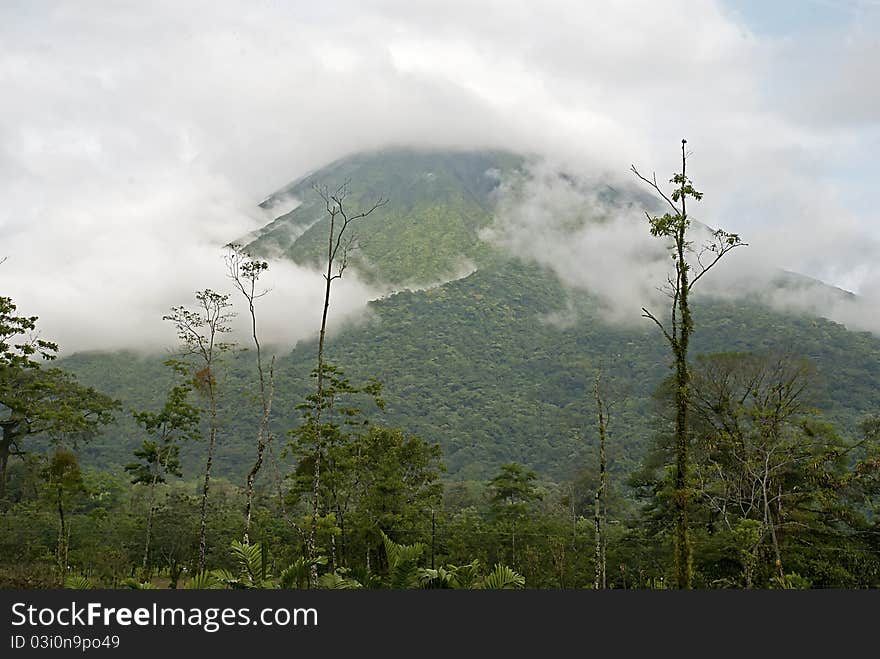 Volcano in a shroud of clouds